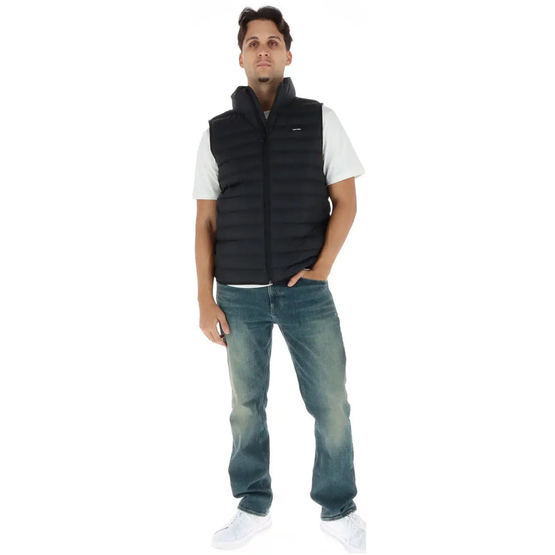 Calvin Klein puffer jacket for men in black with quilted texture, high collar and front zipper, front view