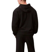 Calvin Klein Sport Sweat à capuche noir en coton pour homme, vu de dos, avec une couture centrale sur la capuche.
