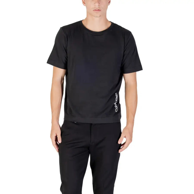 Men’s black short-sleeved Calvin Klein Sport T-shirt with vertical logo print