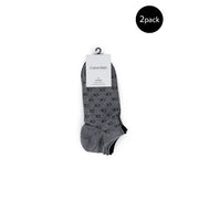 Two-pack of gray Calvin Klein ankle socks with repeating CK pattern for men’s spring summer collection