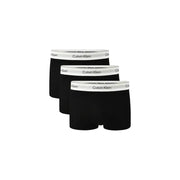 Black Calvin Klein men underwear boxer briefs with white elastic waistband featuring black logo text