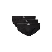 Black Calvin Klein men’s briefs with sleek minimalist design and subtle white logo on waistband for everyday wear