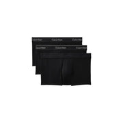 Noir Calvin Klein caleçons boxers avec une bande logo blanche discrète, conçus pour les sous-vêtements masculins