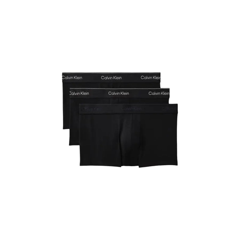 Noir Calvin Klein caleçons boxers avec une bande logo blanche discrète, conçus pour les sous-vêtements masculins