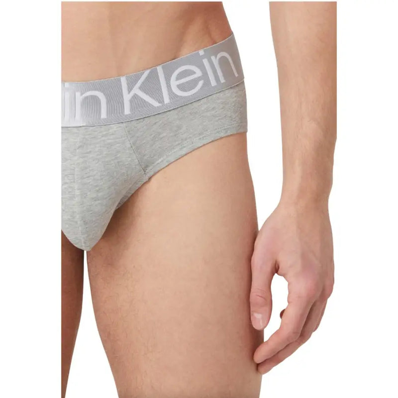 Graue, melierte Calvin Klein Herren-Unterhose mit passendem elastischem Bund und weißem Markenlogo