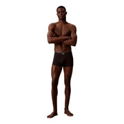 Black calvin klein men underwear boxer briefs with silver logo trim in premium fabric for comfortable wear
