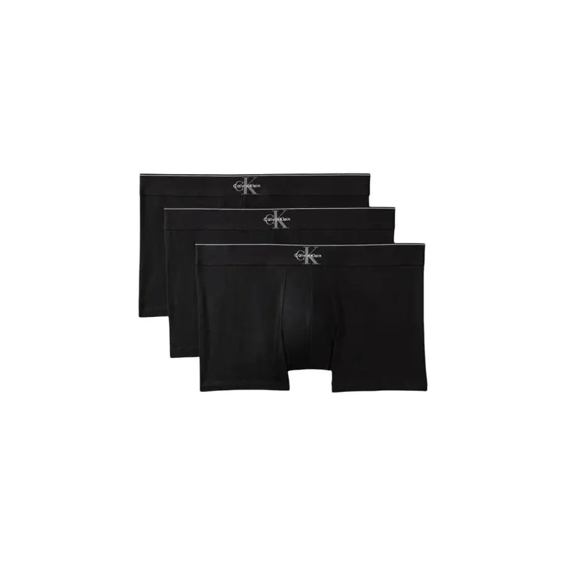 Black calvin klein boxer briefs with subtle white logo on waistband in cotton for men underwear use