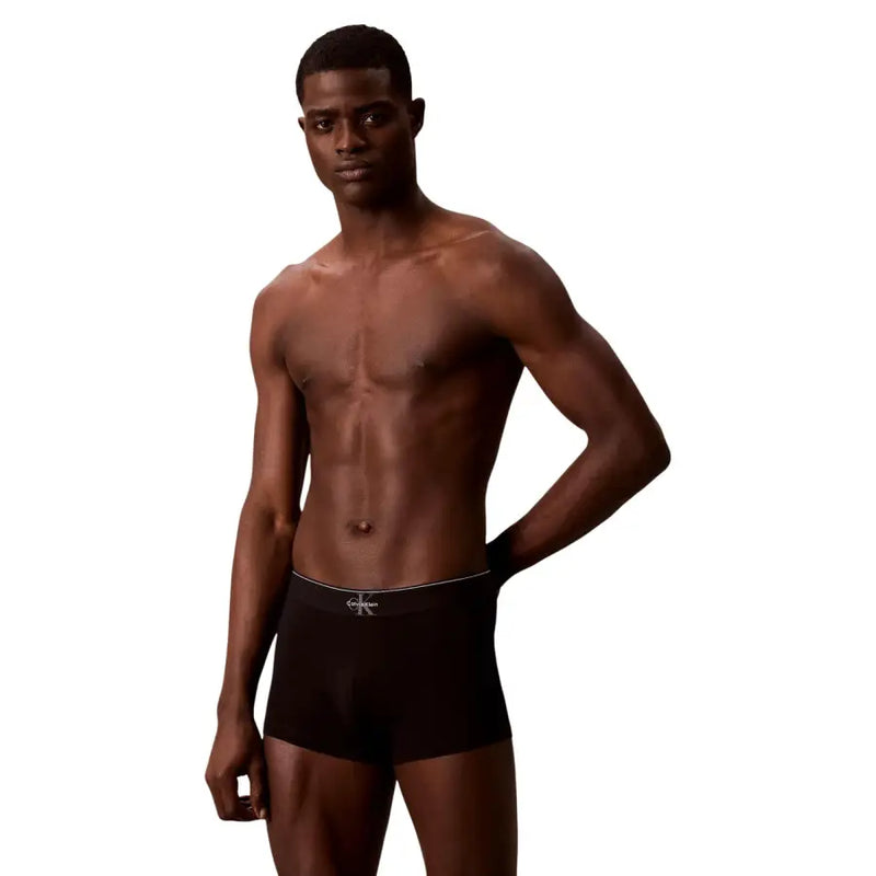 Black calvin klein underwear boxer briefs with white logo and trim designed for men by calvin klein underwear