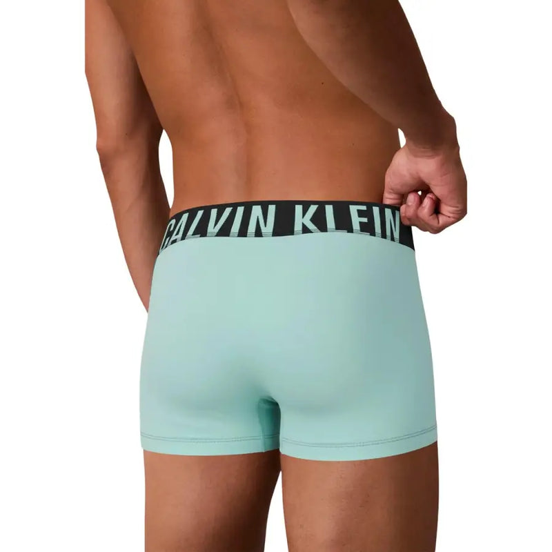 Light blue calvin klein boxer briefs with black waistband featuring white brand logo for men underwear