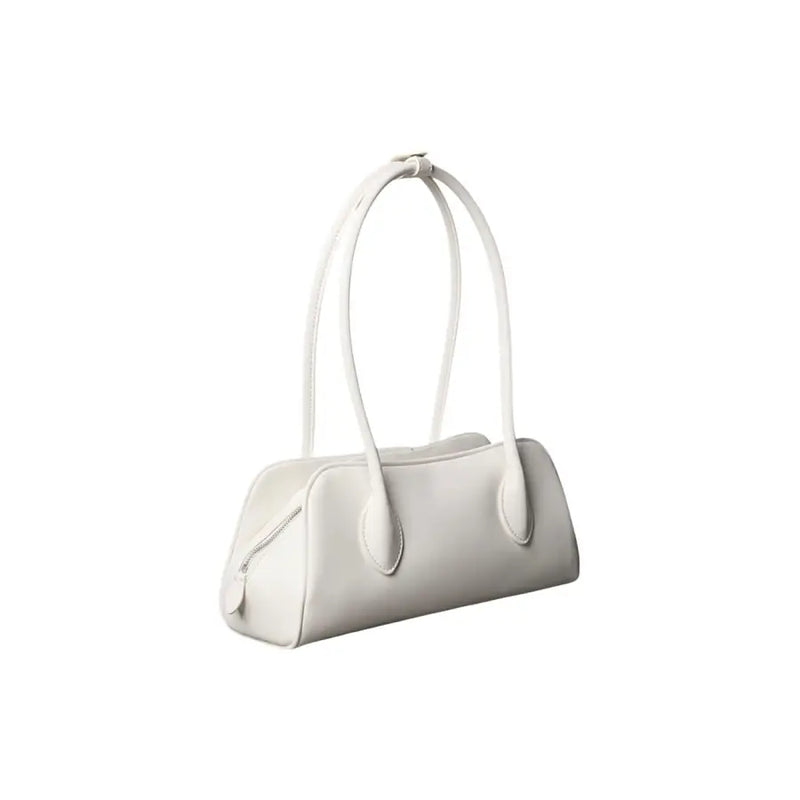A sleek white polyurethane Calvin Klein women bag with zip pockets and curved handles in minimalist design