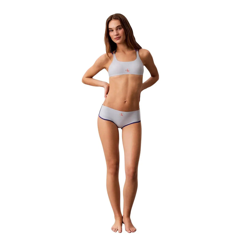 Calvin klein women beachwear light gray underwear set with subtle purple trim and small pink logo on each piece