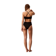Black high-waisted bikini set with crisscross back straps by Calvin Klein for women swimwear