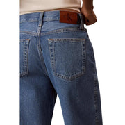 Calvin klein women blue cotton denim jeans showing the back with a brown leather brand patch at the waistband