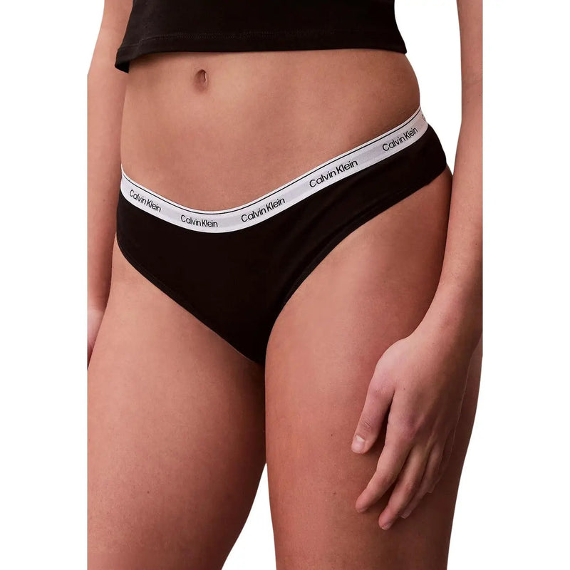 Calvin Klein women Brazilian cotton underwear in black with a white waistband featuring the brand logo