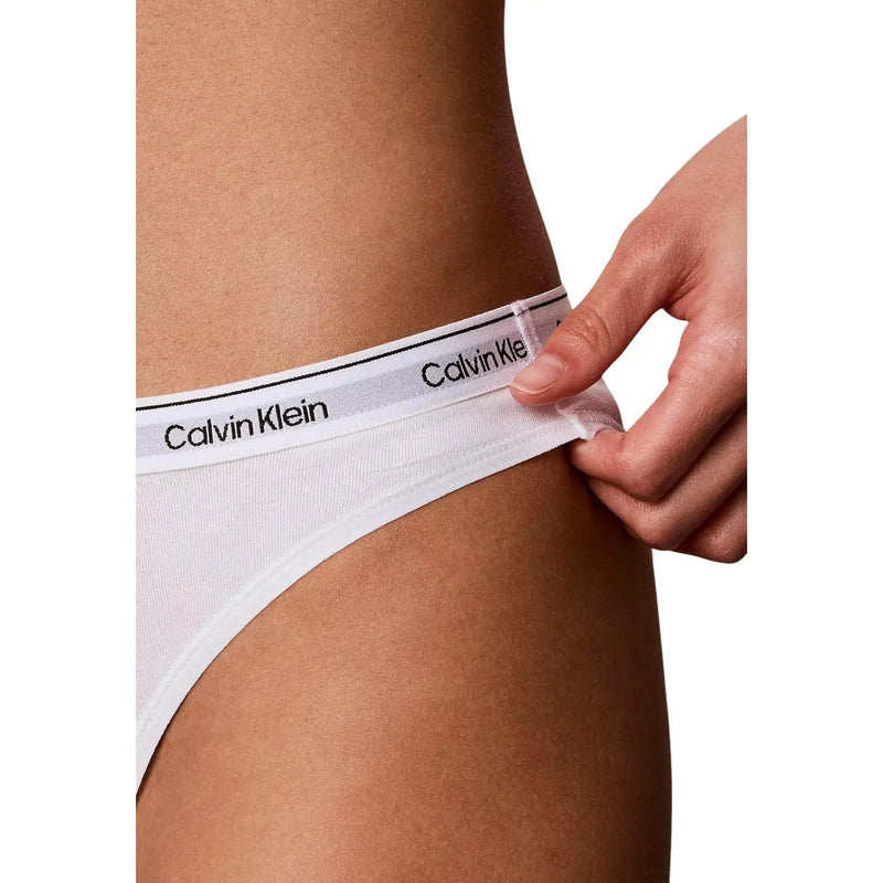 White calvin klein cotton briefs with black logo band shown as part of women cotton bikini underwear black 3 pack