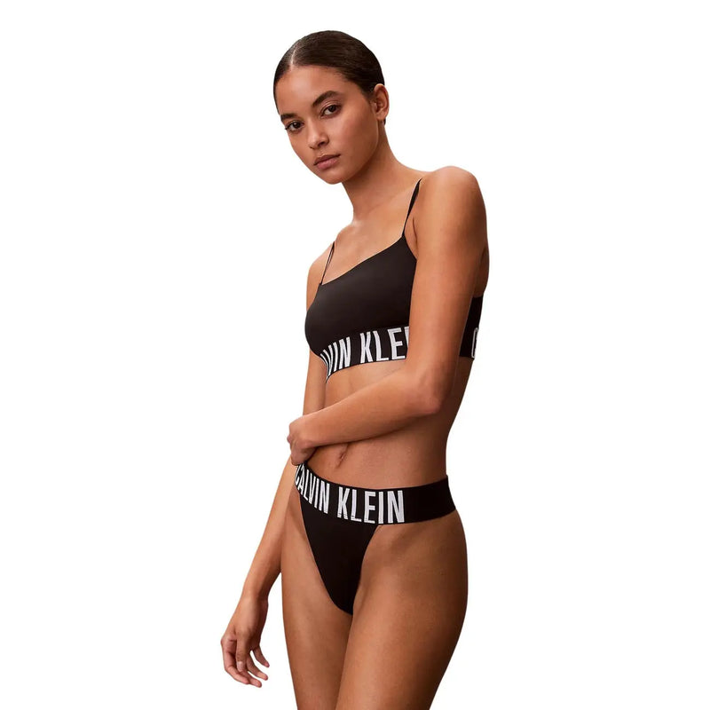 Black calvin klein women high leg thong bikini set with white lettering made of polyester elastane