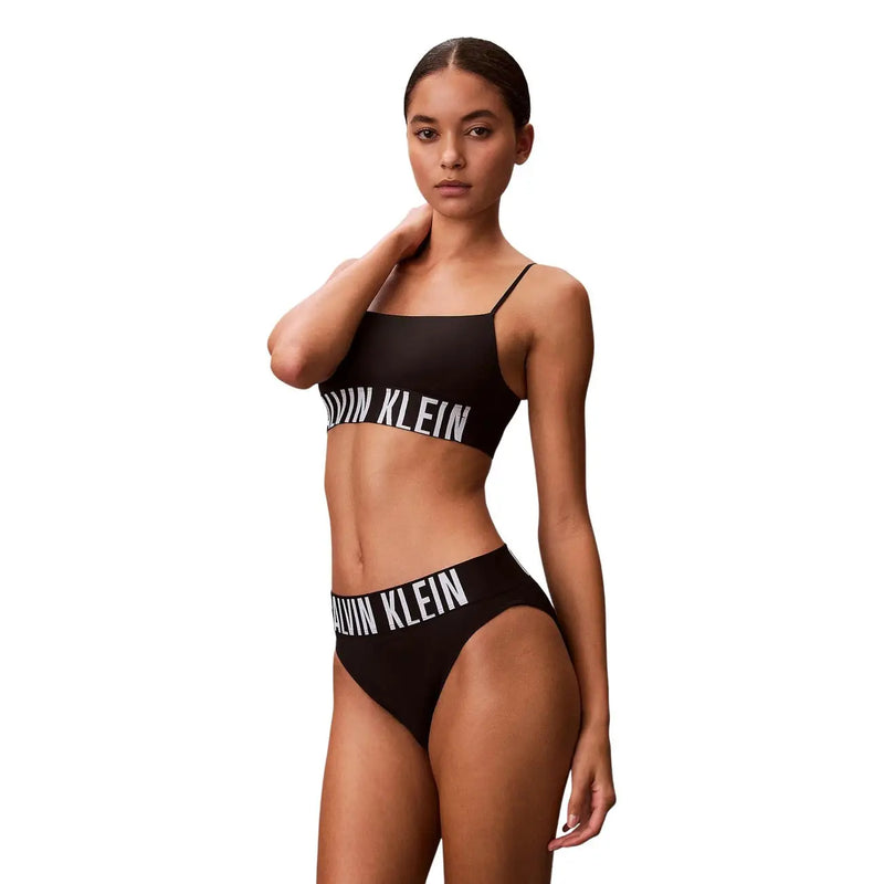 Black Calvin Klein women high waist bikini underwear set with white logo lettering made of 92 polyester
