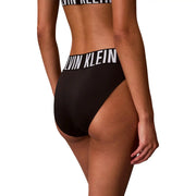 Calvin klein women high waist bikini bottom in black polyester with a bold white logo band visible on the back side