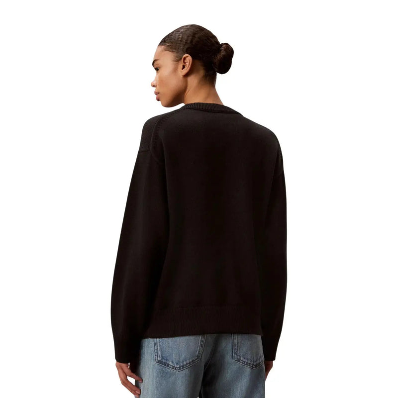 Calvin klein women knitwear black cotton round neck sweater with ribbed neckline and cuffs front view