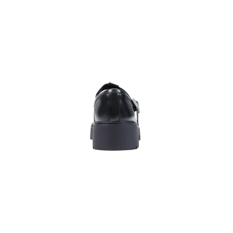 Calvin Klein women leather slip on shoe in black patent leather with chunky platform sole and buckle strap