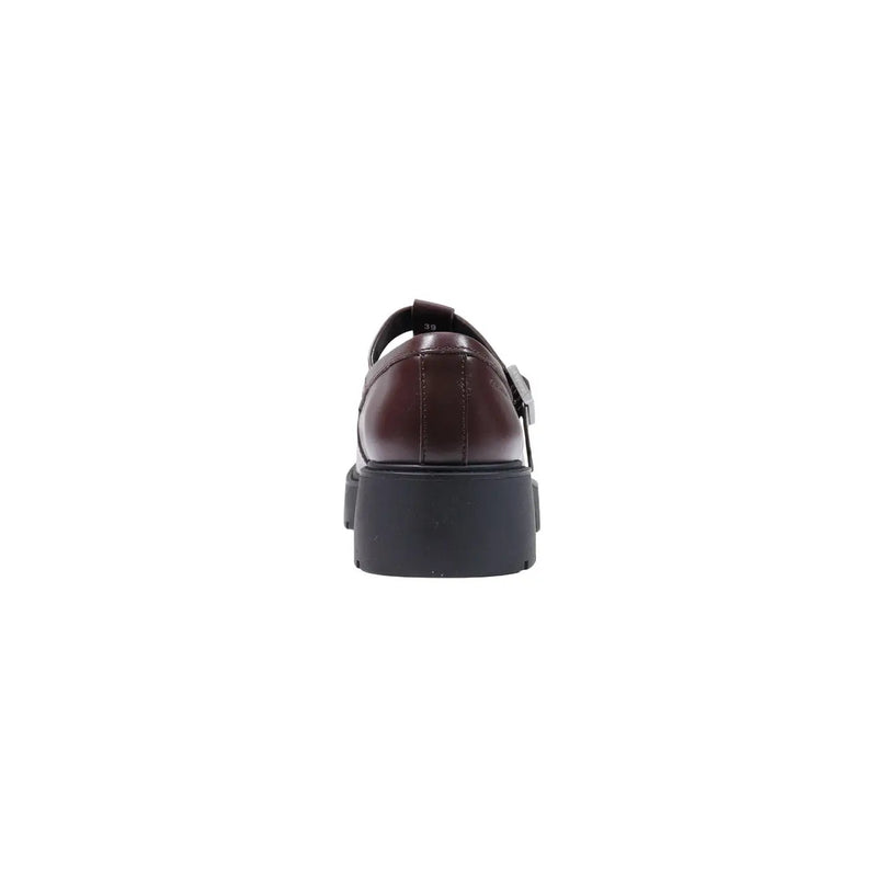 Calvin Klein women leather slip on mary jane shoe in dark brown with chunky black platform sole and silver buckle detail