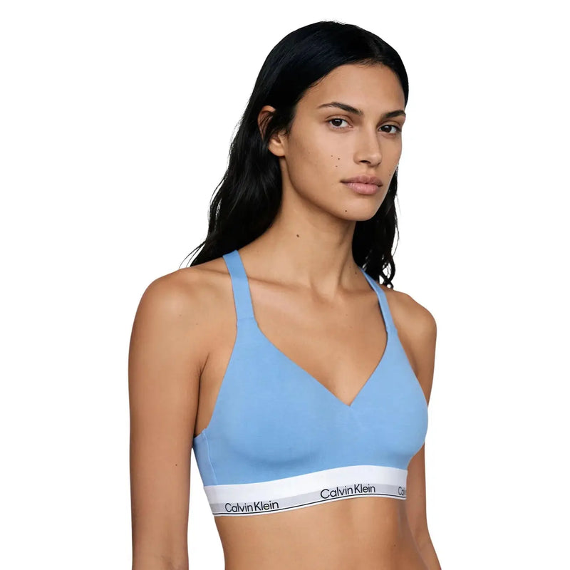 Light blue Calvin Klein women lift bralette with white logo band made of cotton modal stretch fabric