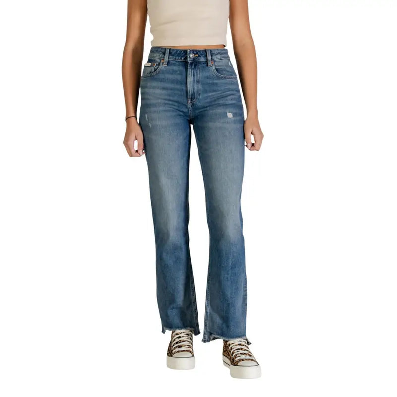 Calvin Klein women light blue distressed flare jeans back view
