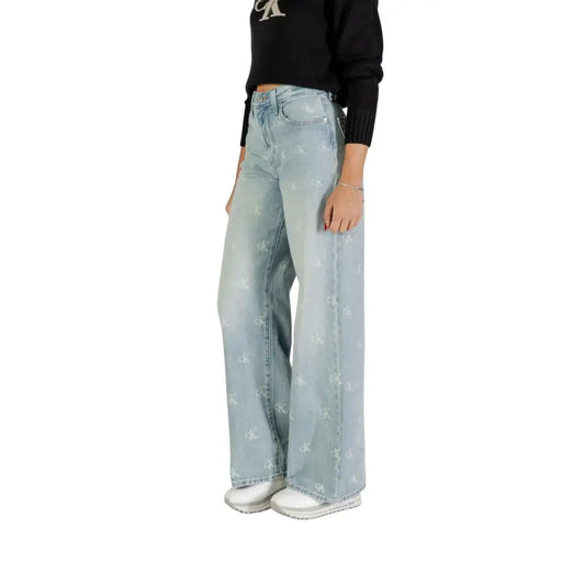 Light wash wide-leg denim jeans with all-over patterned logo from Calvin Klein Women collection