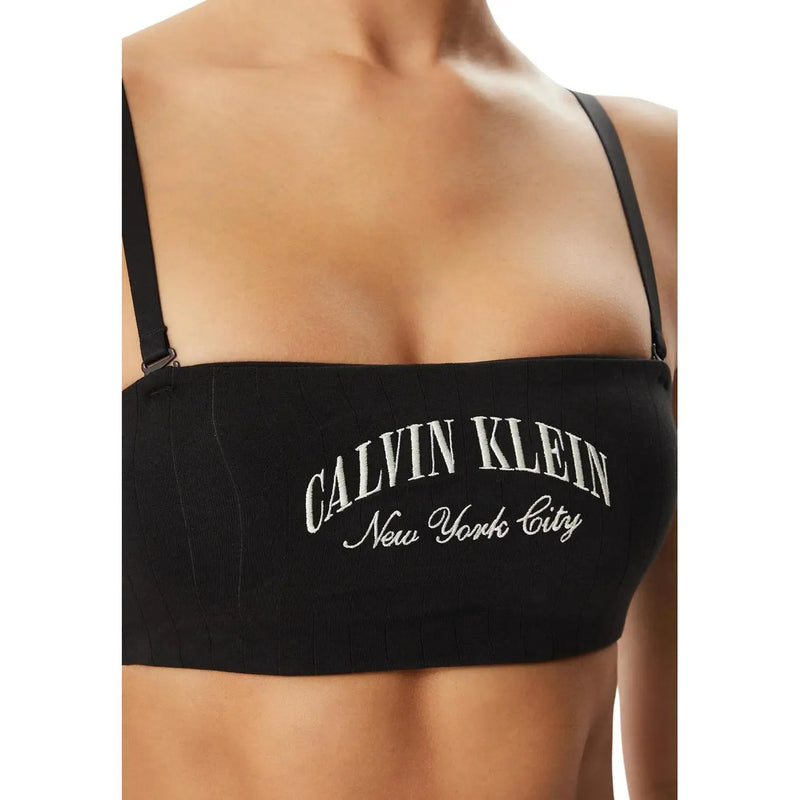 Black cotton lightly lined Calvin Klein women bandeau top with white embroidered Calvin Klein New York City logo