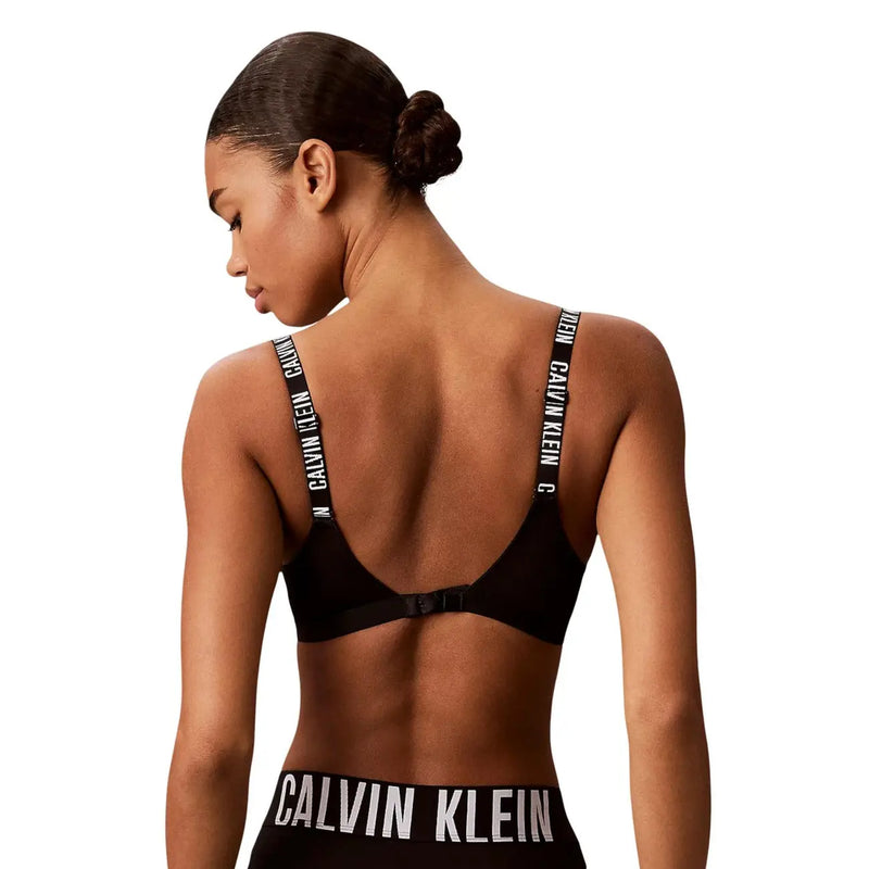 Black calvin klein lightly lined bralette in polyester with adjustable straps featuring white logo lettering