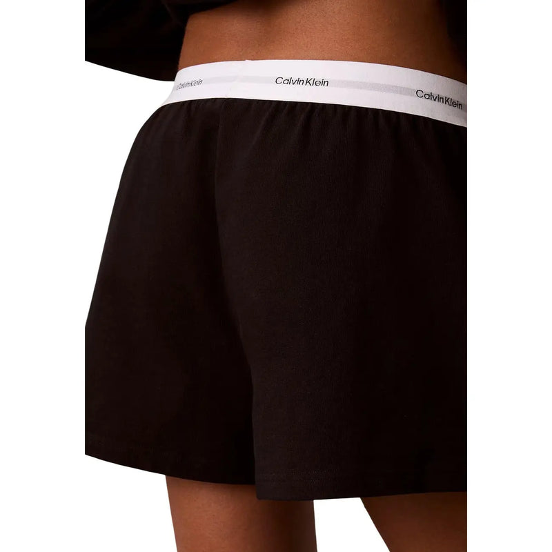 Calvin Klein women logo jersey cotton black boxer shorts with white elastic waistband featuring the brand logo