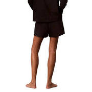 Calvin Klein women logo jersey cotton shorts in black with soft texture relaxed fit and subtle side seam detailing