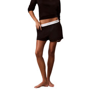 Black Calvin Klein women logo jersey cotton pajama shorts with white elastic waistband featuring brand logo