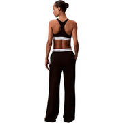 Black Calvin Klein women logo jersey wide-leg cotton pant with a white elastic waistband featuring the brand logo