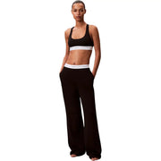 Black Calvin Klein women logo jersey cotton wide-leg pants with white elastic waistband for underwear use
