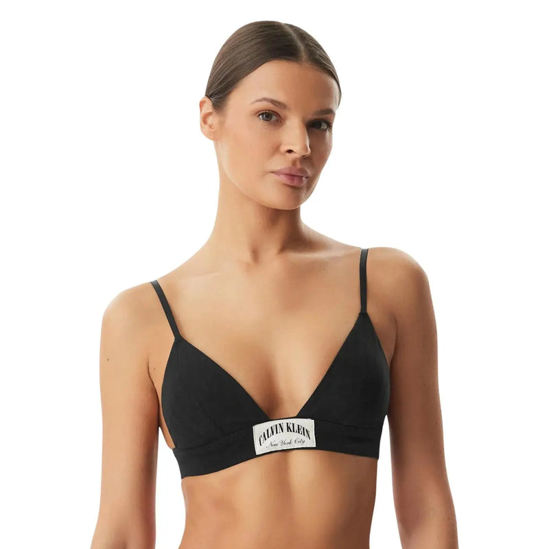 Black Calvin Klein lightly lined triangle bra with thin straps and white logo patch in cotton fabric