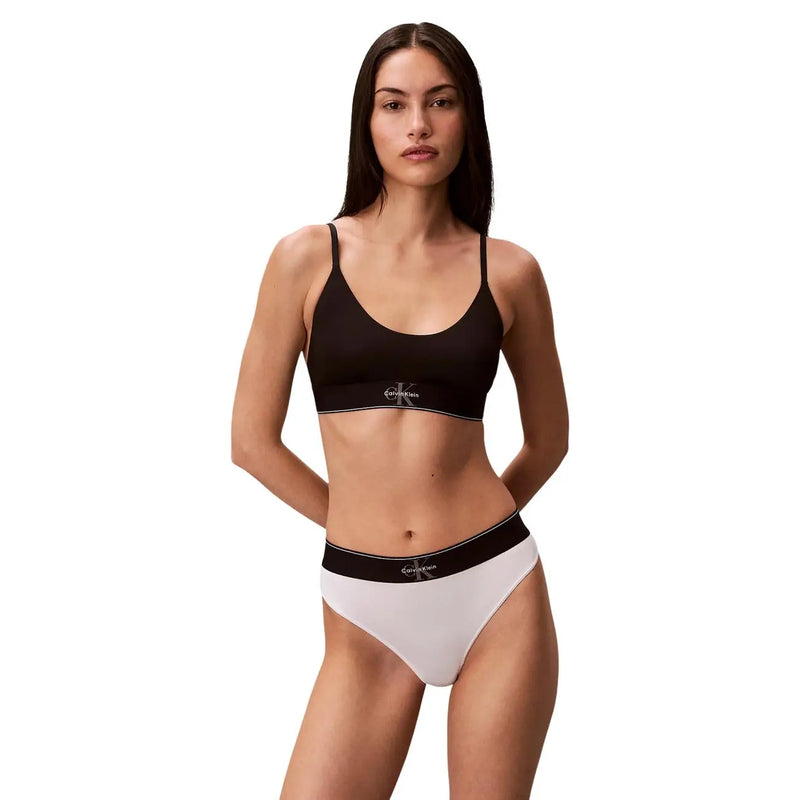 Black and white calvin klein women underwear set featuring polyester thong with classic logo on strapband and waistband