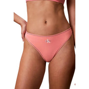 Calvin klein women underwear white polyester thong featuring a pink bikini bottom with stitched trim and embroidered logo