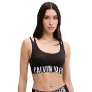 Black Calvin Klein sports bra with white logo band across the chest made of cotton modal for women