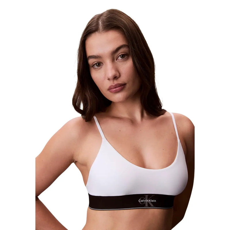 Calvin Klein women unlined bralette in white cotton modal with thin straps and black logo band