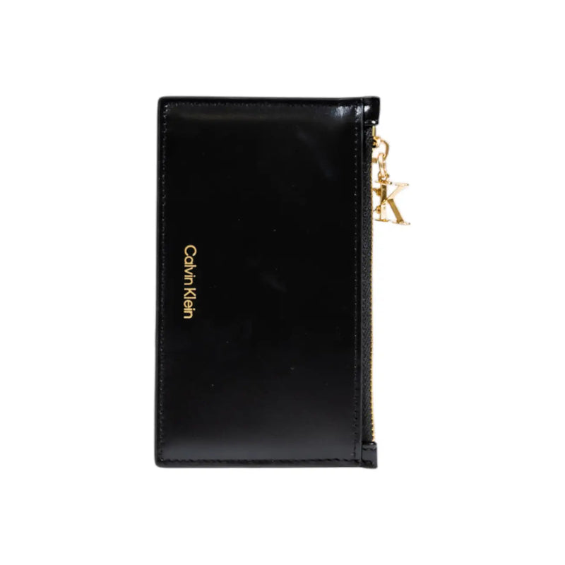 Black Calvin Klein women wallet in faux leather with gold-tone zipper and logo detailing, sized 13x8x0.2 cm