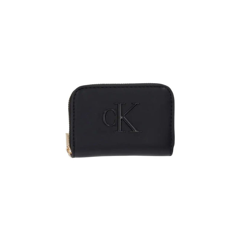 Black Calvin Klein women’s wallet made of polyurethane with zippered closure, embossed logo, and gold-tone zipper pull