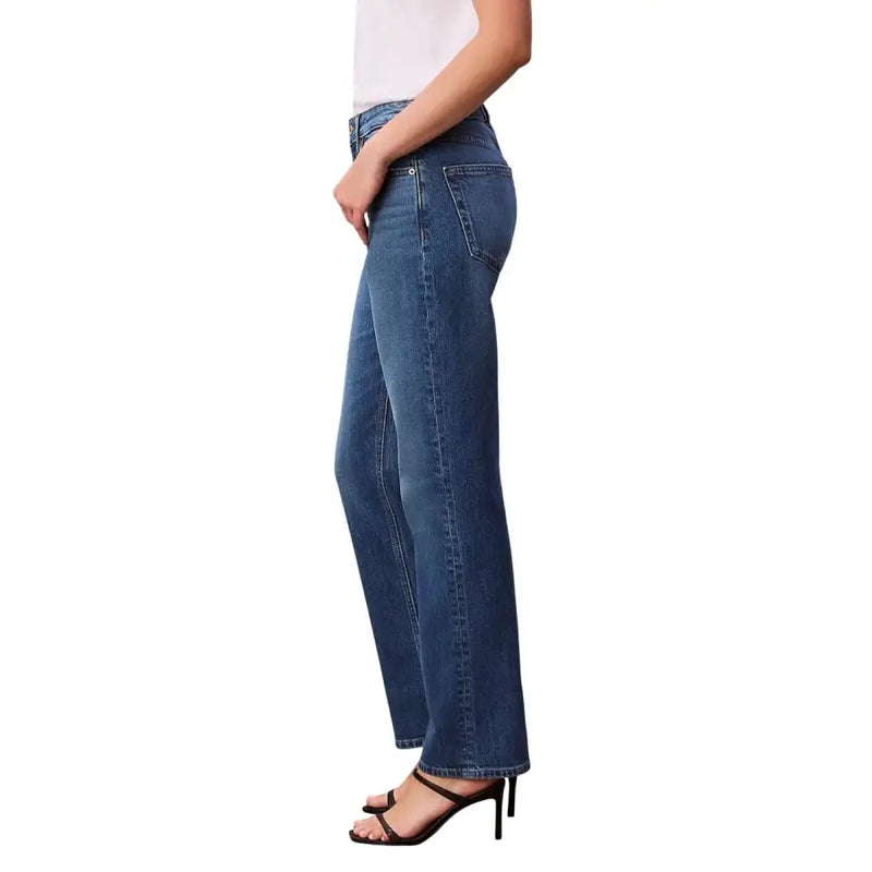 Calvin Klein women’s high-rise straight-leg medium-wash blue cotton stretch jeans showing rear pockets