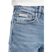 Back side of light-wash cotton denim jeans featuring a classic calvin klein brand label on the back pocket