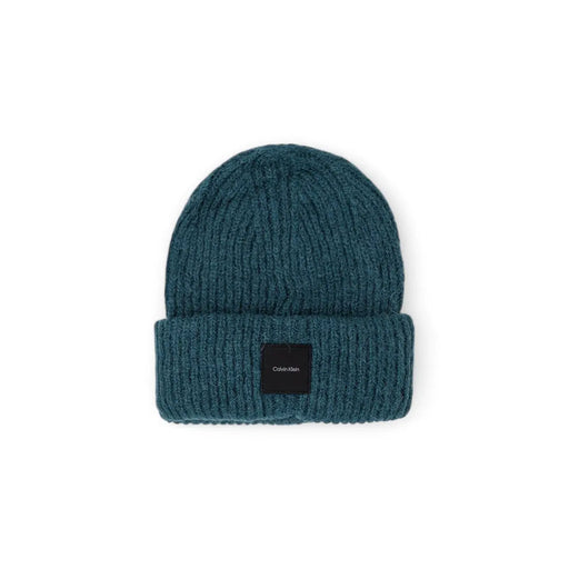 Calvin Klein wool cap for men in teal ribbed knit with folded cuff and black logo patch, front view