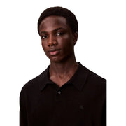 Calvin Klein wool sweater for men in black with subtle embroidered logo on chest, front view