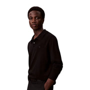 Calvin Klein wool sweater for men in black with long sleeves and embroidered chest logo, front view