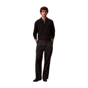 Calvin Klein wool turtleneck sweater for men in black with ribbed texture and quarter-zip, front view