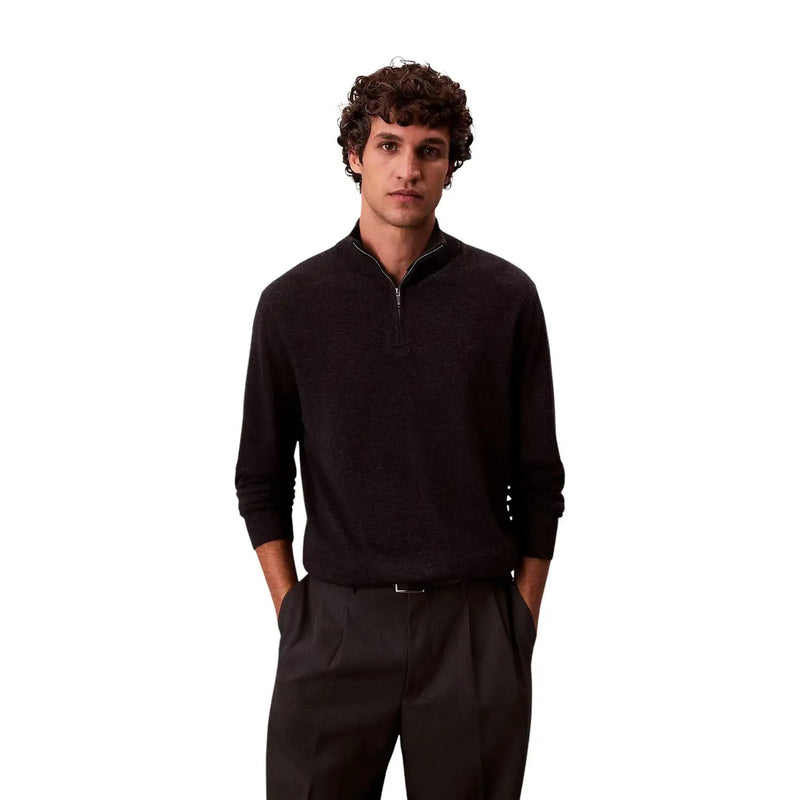 Calvin Klein wool turtleneck sweater for men in black merino wool with half-zip and ribbed cuffs, front view