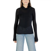Black sheer turtleneck long sleeve fitted top made of cashmere modal from choral women collection